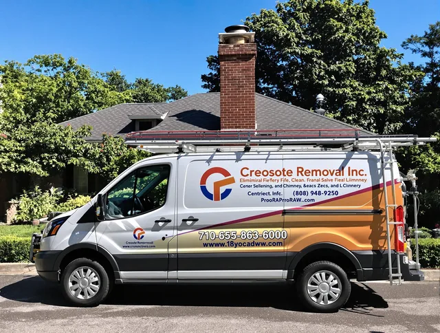 Powell Chimney Sweep technician removing creosote safely in Powell, OH